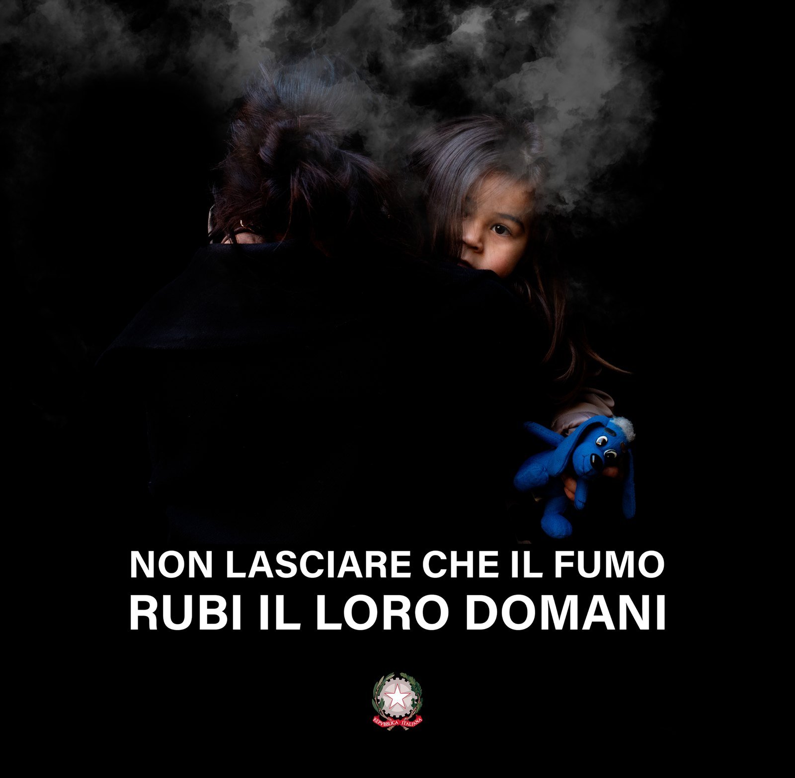 Anti-smoking campaign: mother and child in the smoke
