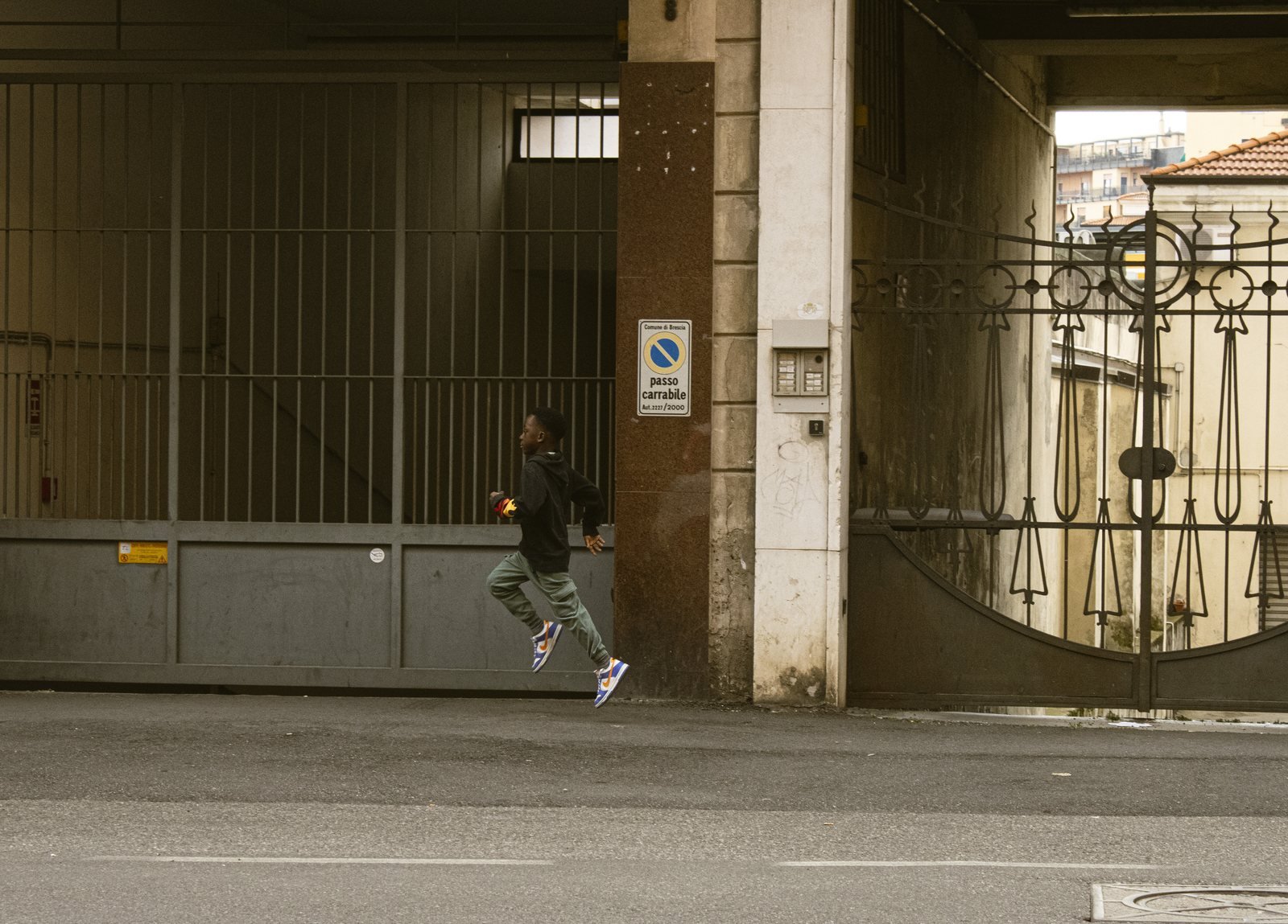 A boy running outdoors